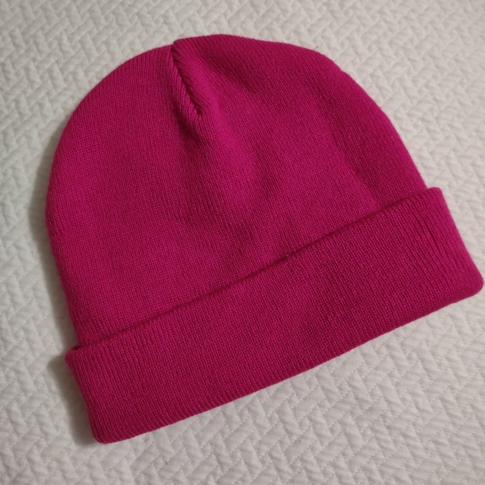 Pink knitted winter warm beanie hat